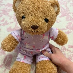 Zipn’ Bear Tan Teddy Bear in Unicorn Pajamas